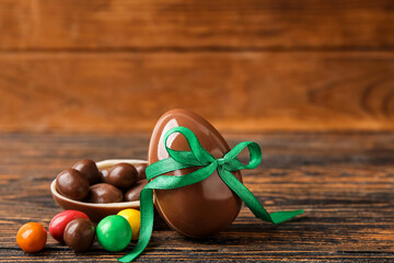Chocolate Easter eggs on wooden background
