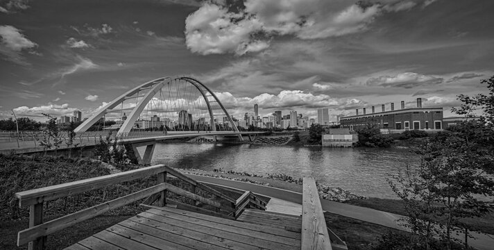 Fototapeta Bridge over river. Panoramic view of downtown Edmonton, Alberta, Canada in Black and White.