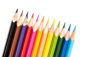 Colored pencils background. Color pencils on white background.