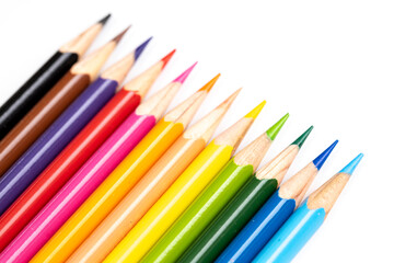 Colored pencils background. Color pencils on white background.