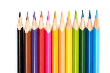 Colored pencils background. Color pencils on white background.