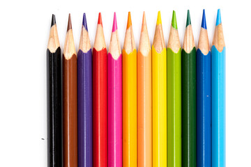 Colored pencils background. Color pencils on white background.