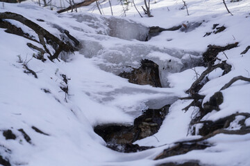 Fototapeta na wymiar Badly frozen in Bucegi National Park, Romania.