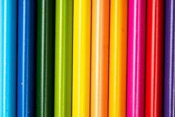 Colored pencils background. Color pencils on white background.