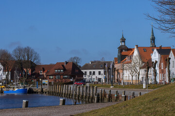 View to the picturesque port of the dreamy coastal town Tönning with a charming row of houses.