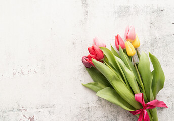 Bunch of spring tulips over white background