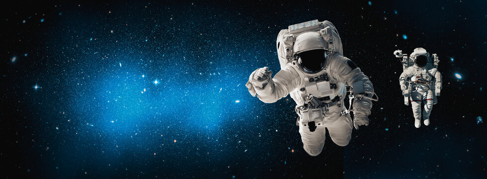 Astronaut spaceman do spacewalk while working for space station in outer space . Astronaut wear full spacesuit for space operation . Elements of this image furnished by NASA space astronaut photos.