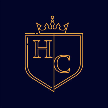 HC initial logotype, colored orange with emblem and crown, line art and classic design, isolated on dark background.