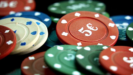 casino chips on the mirror table. Four aces and poker playing chips on a mirror . Online gambling. Casino play.