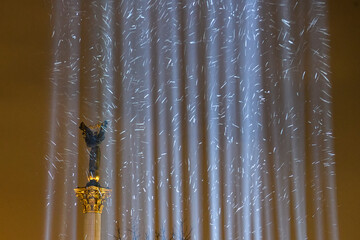 Light beams, which symbolize activist's souls killed during anti-government protests in 2014. Kyiv,...