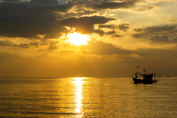 Fototapeta na wymiar boat at sunset, Fishing boats at sunset, Bang Lamung, Chon Buri, Thailand