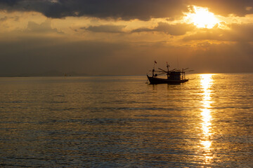 boat at sunset,Fishing boats at sunset, Bang Lamung, Chon Buri, Thailand