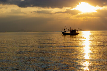 boat in the sunset ,Fishing boats at sunset, Bang Lamung, Chon Buri, Thailand