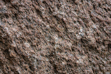 texture of an old field rock. close up of a big boulder, abstract pattern background
