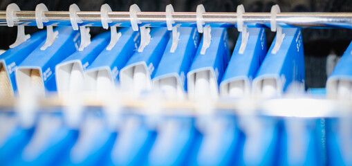 Fototapeta premium Sports white socks in blue packaging.