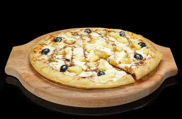 pizza on a wooden tray, black glass.