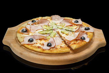 pizza on a wooden tray, black glass.