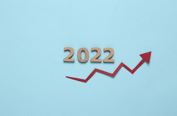 Arrow growth and 2022 on blue background