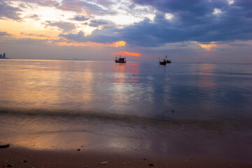sunset on the beach , Fishing boats at sunset, Bang Lamung, Chon Buri, Thailand