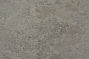 Dark gray textured  decorative background of rough aged plaster with space for text