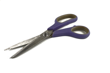 Scissors with purple handles isolated on white with copy space
