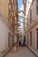 worker on the street in the old town