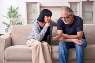 Old couple having argument at home