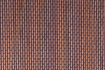 Fototapeta premium The texture of the wooden weaving is brown.