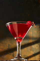 Cocktails in glassware on stone background