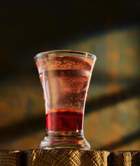Cocktails in glassware on stone background