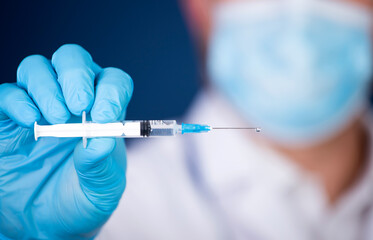 Herd immunity in community, doctor with vaccine.