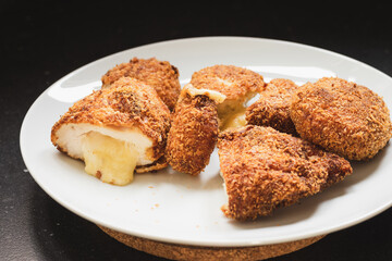 Chicken nuggets filled with cheese