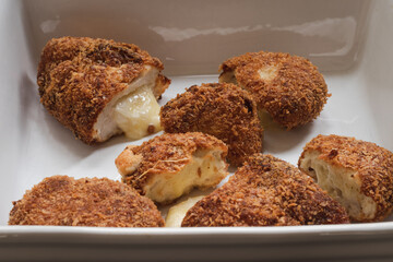 Chicken nuggets filled with cheese