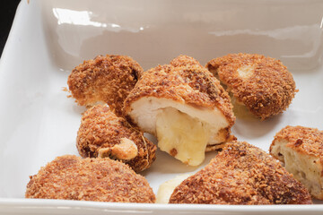 Chicken nuggets filled with cheese