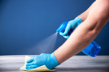 Cleaning surfaces with an antiseptic during a coronavirus epidemic.