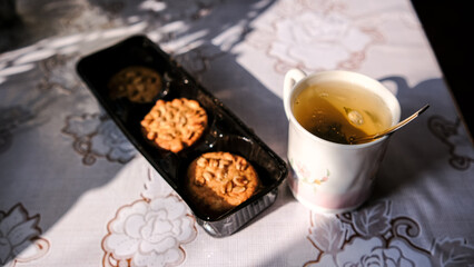 Morning green tea with cookies. Breakfast.