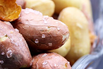 salted peanuts in a glass bowl