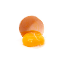 The egg cracked with liquid yolk.