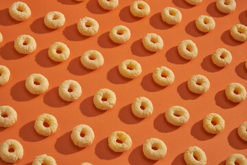 Dry breakfast patterns top view on colored background