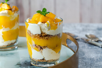 Mango, granola and vanilla yogurt desset