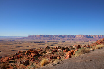 panorama view, red desert landscape and blue sky at a sunny day