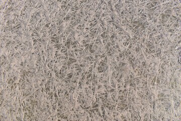 A high resolution old concrete cement with cracks and natural destruction from time and weather conditions