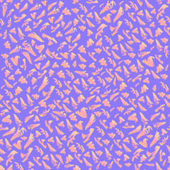 Seamless pattern of gold elements on a purple background. For textiles, wallpapers and backgrounds.