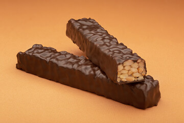 Chocolate candy on a colored background