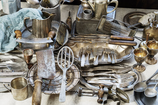 Vintage kitchen utensils as a photography props on concrete background