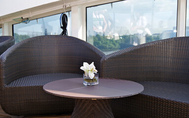 Luxury sun loungers and deck lounge chairs on terrace, patio or balcony sun deck of luxury French...