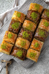 Turkish Ramadan Dessert Baklava from pistachios and walnuts. Selective focus.