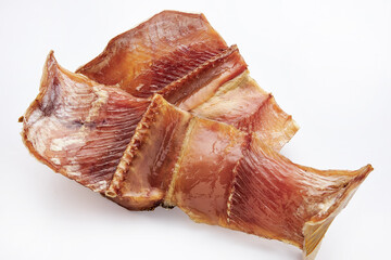 Dried salted fish on a white background