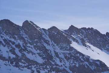 Obraz premium Mountain spikes of mountain peak Trugberg seen from Jungfraujoch, Switzerland. Photo taken February 26th, 2021, Jungfraujoch, Switzerland.