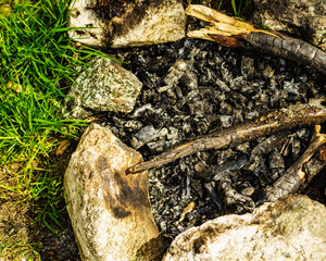 Stone fireplace outdoor. Bonfire.